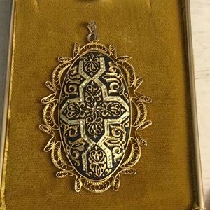 Vintage damascene pendant.